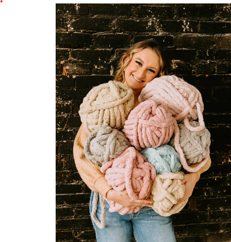Instructor holding chunky yarn